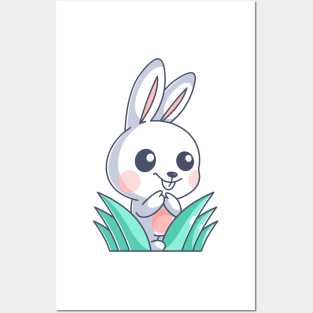 Cute bunny hiding in the grass Posters and Art